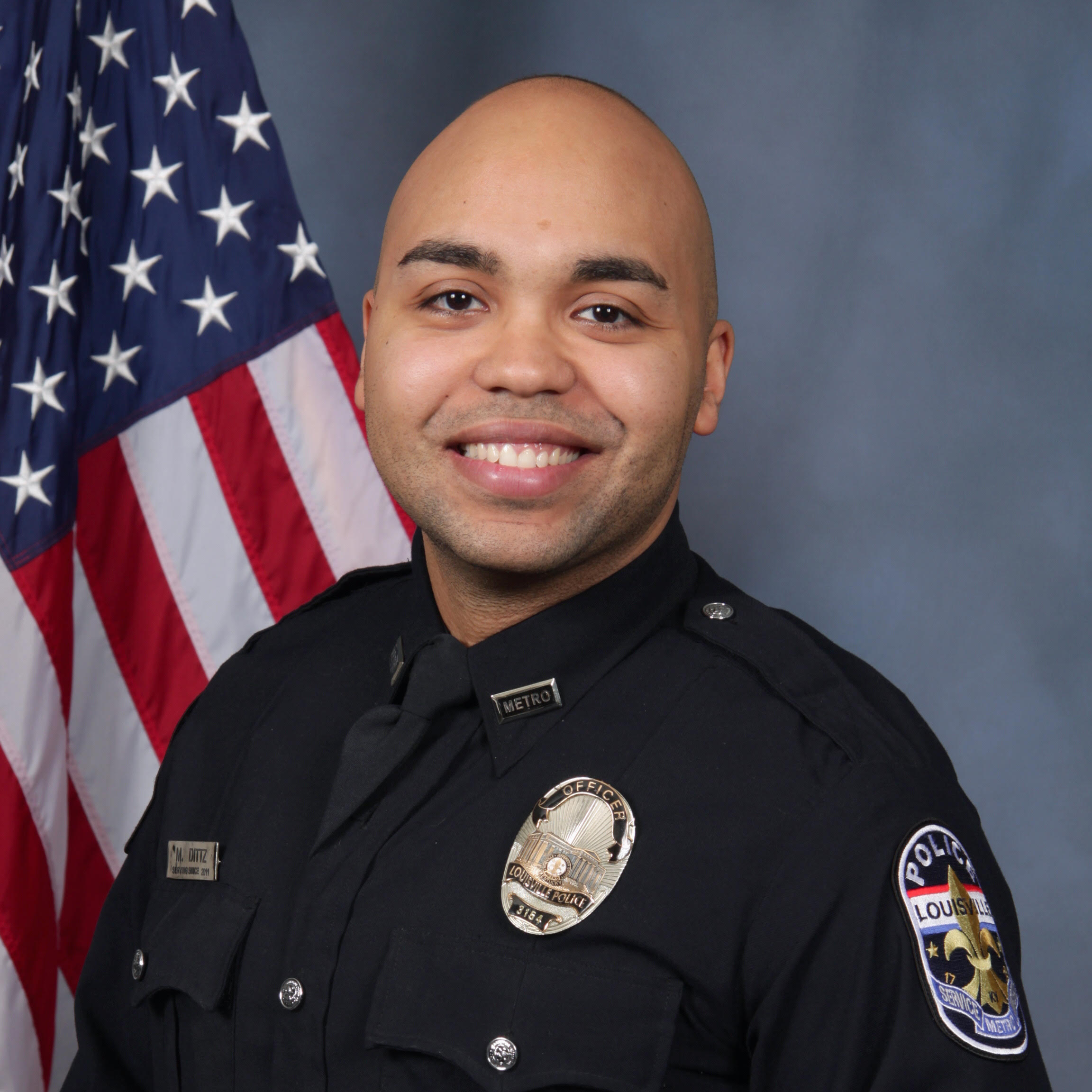 OFFICER Mauricio Dittz image with smiling face