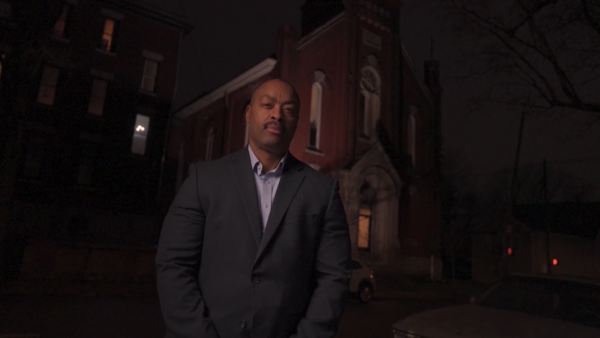 Screenshot of the Michael Bogan Behind the Badge video.